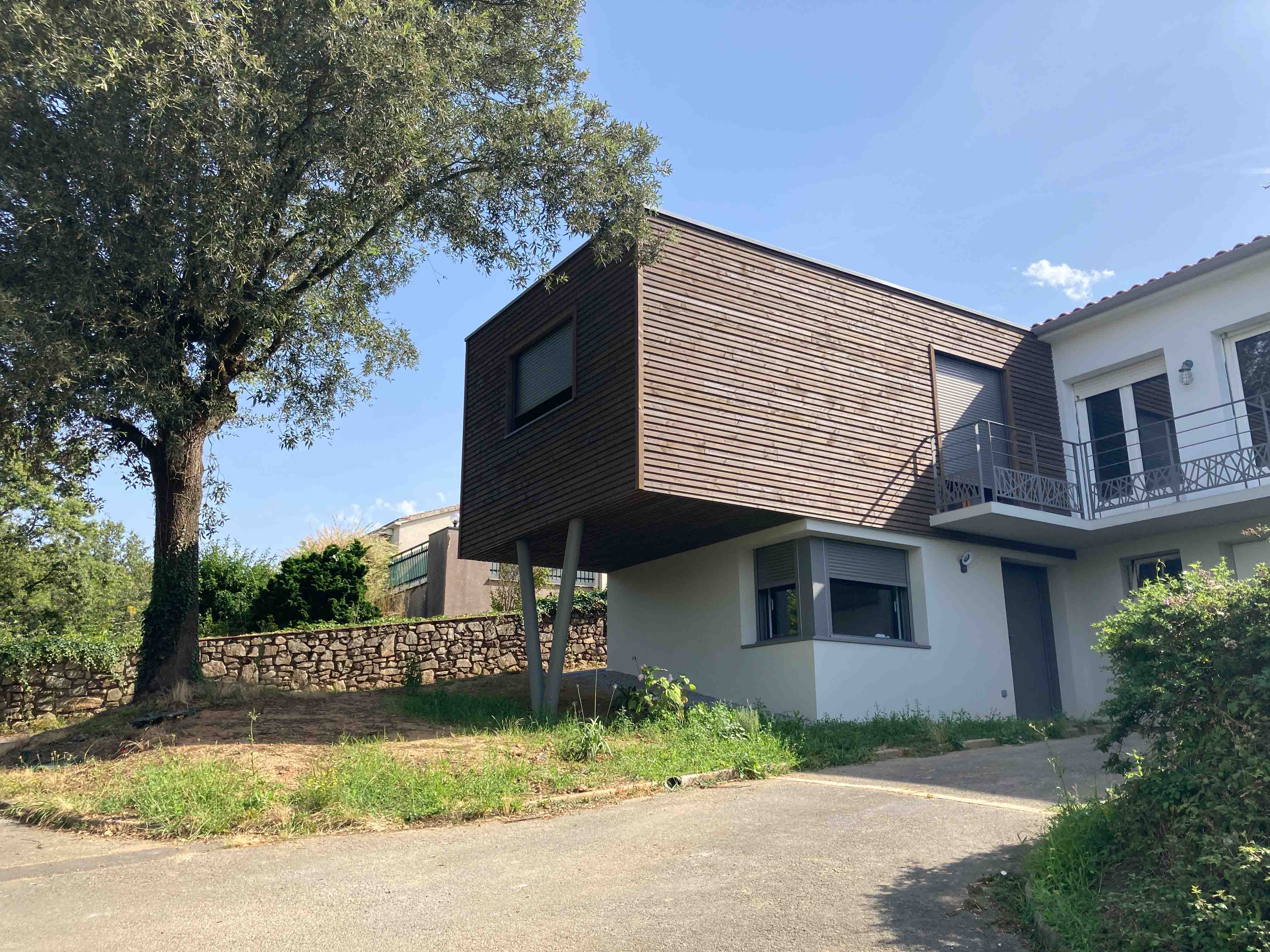 Création d'une extansion pour une maison ancienne avec 2 chambres et un bureau